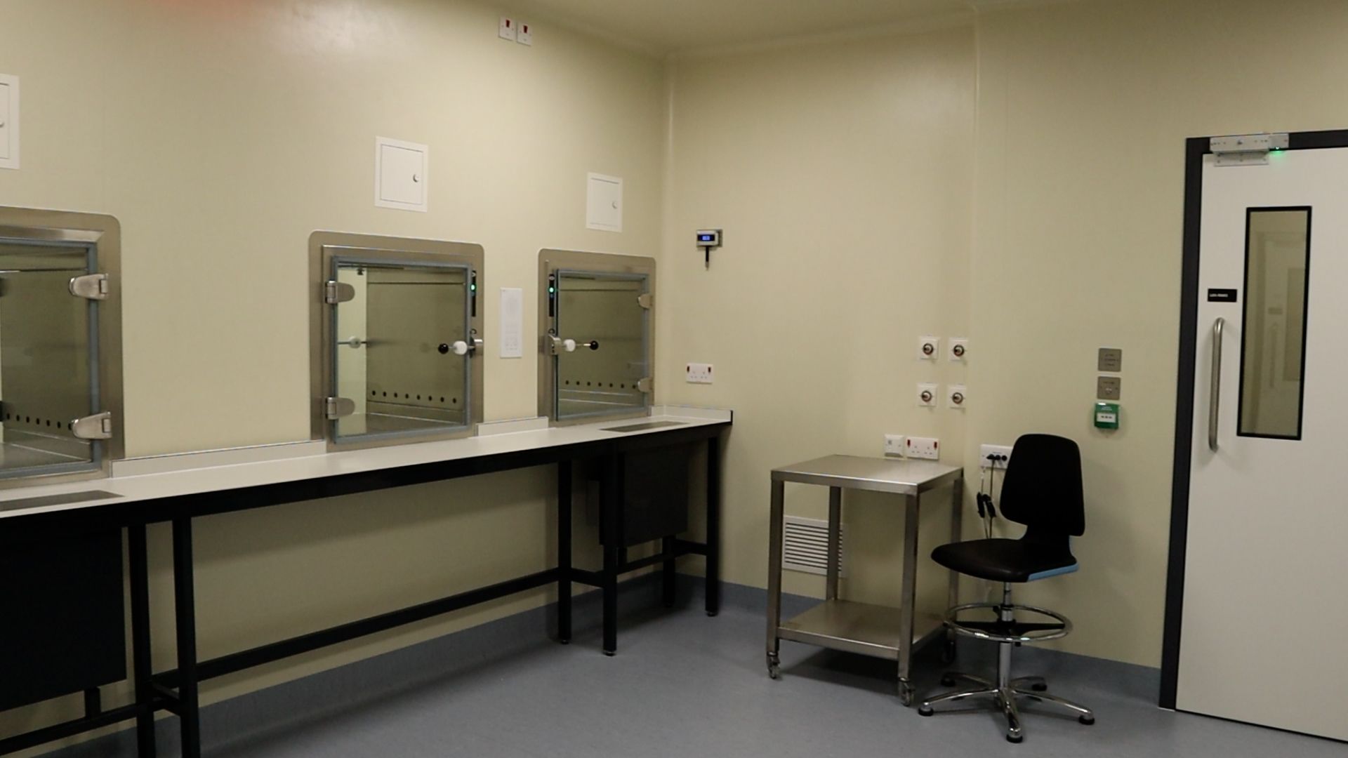 New air filter door locks, and some table and chairs inside a new laboratory